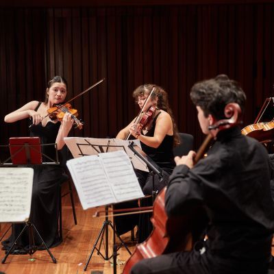 Photo of students on stage performing